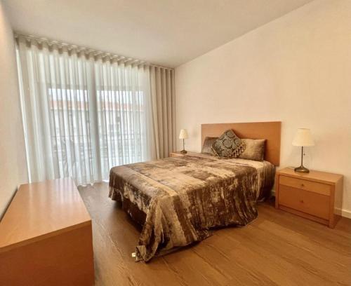 Giường trong phòng chung tại The Navigator Olympus