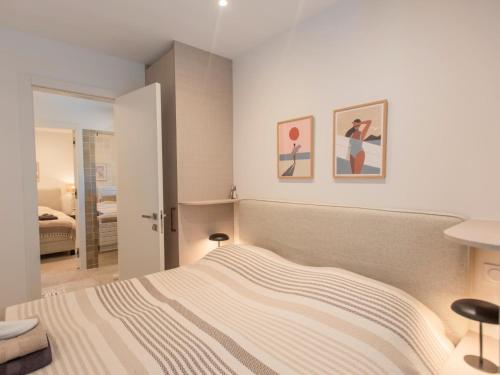 Postel nebo postele na pokoji v ubytování La Neptune