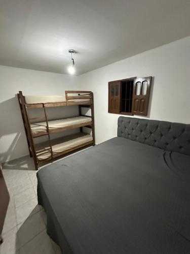 Ένα ή περισσότερα κρεβάτια σε δωμάτιο στο Republic Mansão