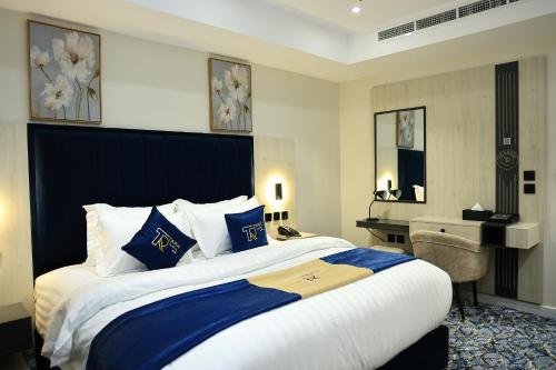 Postel nebo postele na pokoji v ubytování فندق تارا بلس Tara Plus Hotel