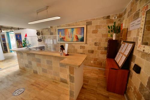 a kitchen with a counter in a room at Mango & Apartments in Tumbes