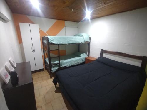 Ένα ή περισσότερα κρεβάτια σε δωμάτιο στο Alojamiento Lety