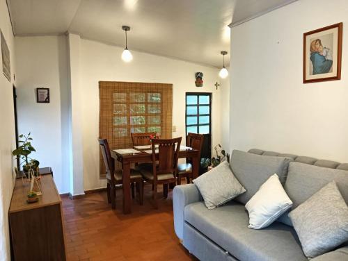 a living room with a couch and a table at Villa Alegría in Choachí