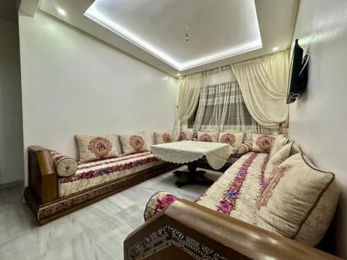 Posezení v ubytování Appartement spacieux avec parking