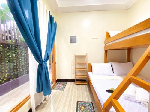 Postel nebo postele na pokoji v ubytování Sudla Siargao Hostel
