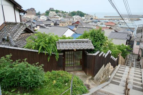 a view of a city from a house at そわか楼 in Fukuyama