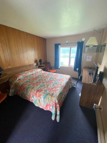 Кровать или кровати в номере ValleyView Motel