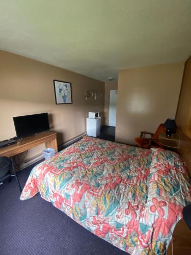 Кровать или кровати в номере ValleyView Motel
