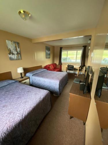 Postel nebo postele na pokoji v ubytování ValleyView Motel