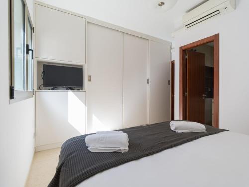 Postel nebo postele na pokoji v ubytování Apartment in Las Palmas near Playa de Las Canteras