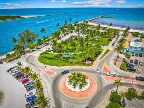 an aerial view of a parking lot next to the ocean at Sea Breeze Retreat in Fort Pierce