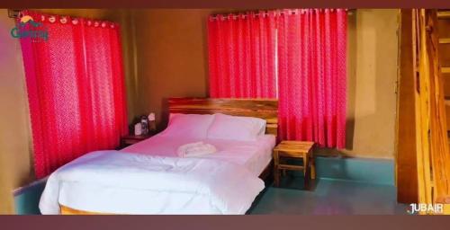 Postel nebo postele na pokoji v ubytování Giri Raj Resort Bandarban