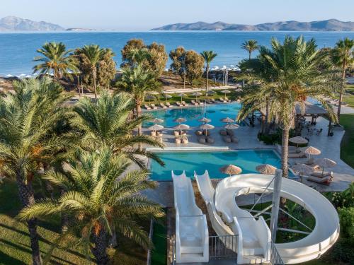 an aerial view of a resort with a swimming pool at Grecotel Casa Paradiso in Marmari