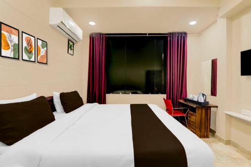 Letto o letti in una camera di Hotel O Kakadeo Kanpur