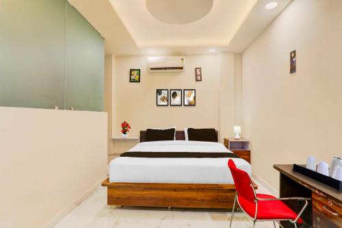 Letto o letti in una camera di Hotel O Kakadeo Kanpur