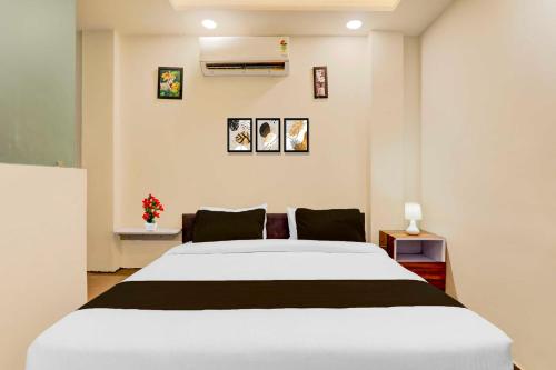 Letto o letti in una camera di Hotel O Kakadeo Kanpur