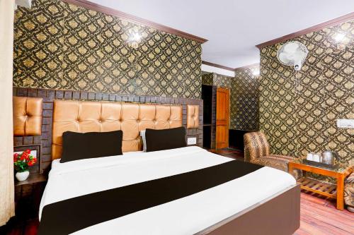 Postel nebo postele na pokoji v ubytování Hotel O Mall Road