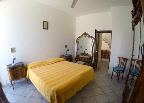 Katil atau katil-katil dalam bilik di Turistcasa Corso Umberto 181