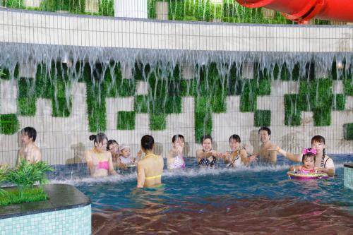 a group of people in a swimming pool at Kinugawa Hotel Mikazuki in Nikko