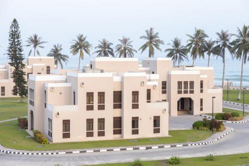 a rendering of a villa in front of the ocean at Al Shatti Villas in Salalah