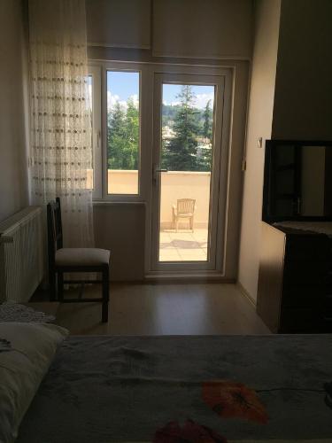 A bed or beds in a room at Safa Apartment