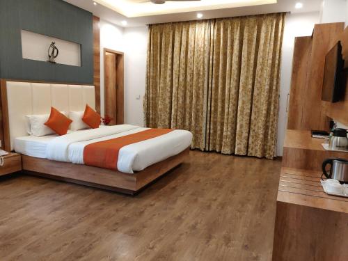 Una cama o camas en una habitación de Yelchiko
