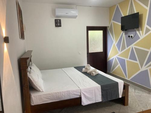 Katil atau katil-katil dalam bilik di Snapper guste house
