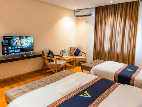 Μια τηλεόραση ή/και κέντρο ψυχαγωγίας στο Apex Hotels and Resorts Skardu