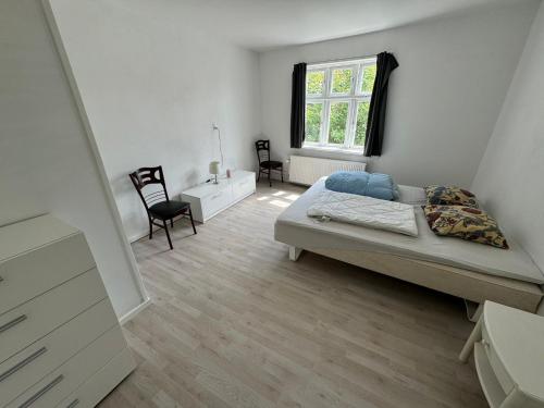 Postel nebo postele na pokoji v ubytování Thistedvej 85C, Room 4