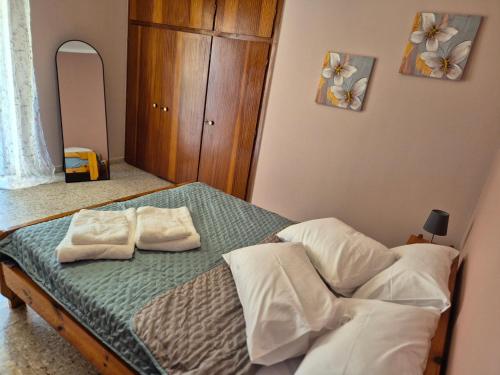 Katil atau katil-katil dalam bilik di Lilia Apartments A2