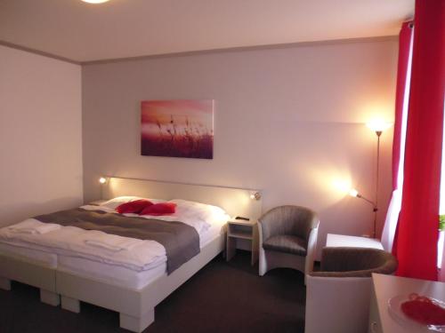 Cama o camas de una habitación en Pension Kamenný Dvůr