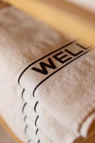 a newspaper with the word new on it at Alpenpension Pfurtscheller in Neustift im Stubaital
