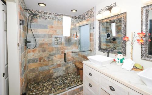 a bathroom with two sinks and a shower at Majestic Getaway 1427 in Gatlinburg