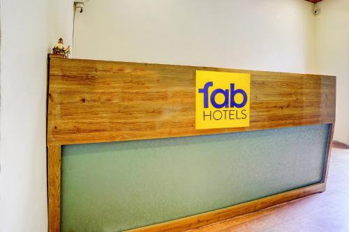a sign on a wall that readsedia huts at FabExpress Sumit Palace in Mumbai