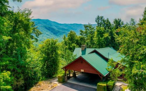 an overhead view of a house with a green roof at Treetop Retreat in Gatlinburg