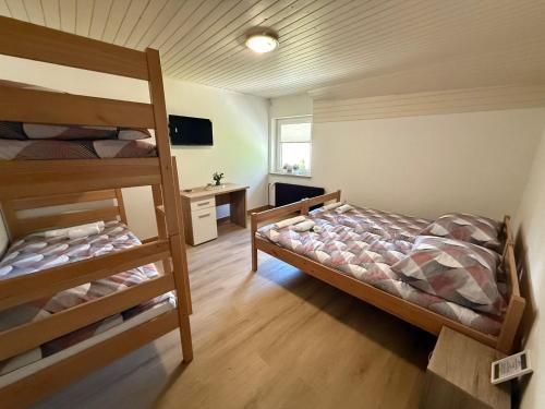Postel nebo postele na pokoji v ubytování Bed & Breakfast LakeBled House