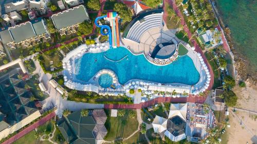 an overhead view of the pool at a resort at Oz Hotels Incekum Beach in Alanya