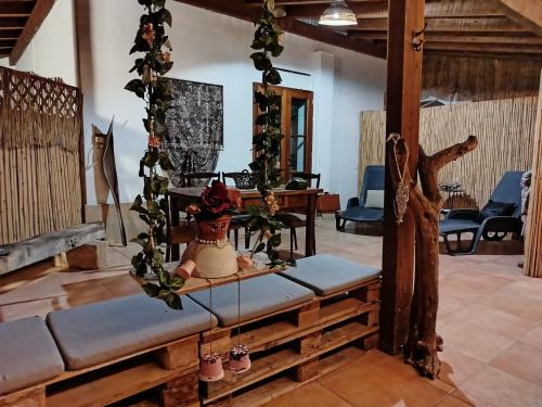 a living room with a couch and a table at Casa vacanze La canzone del sole in Torre Squillace