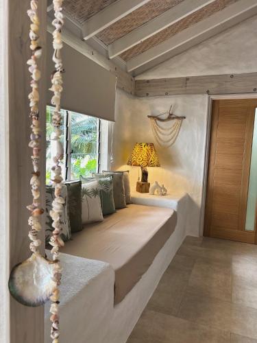 Postel nebo postele na pokoji v ubytování Coco Bay Villa - Luxury in Simplicity