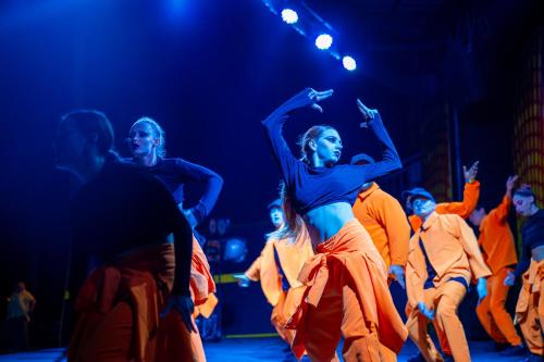 a group of people dancing on a stage at Oz Hotels Incekum Beach in Alanya