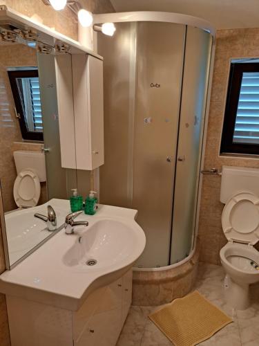 Kúpeľňa v ubytovaní Apartman GRL