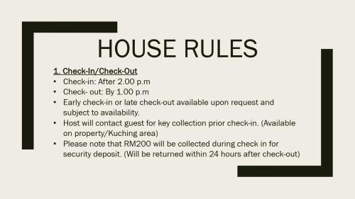 a black frame with a house rules text at Santubong Suites - SS in Kuching