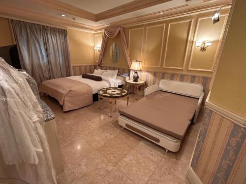 Postel nebo postele na pokoji v ubytování Hotel Grand Garden (Adult Only)