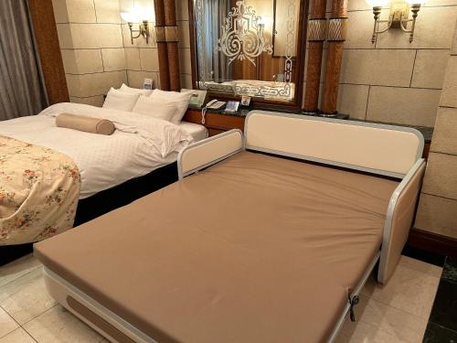 Postel nebo postele na pokoji v ubytování Hotel Grand Garden (Adult Only)