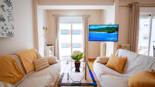 A television and/or entertainment centre at Apto en el Centro La Casita de Gaos