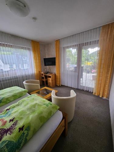 TV a/nebo společenská místnost v ubytování Haus Hubertus