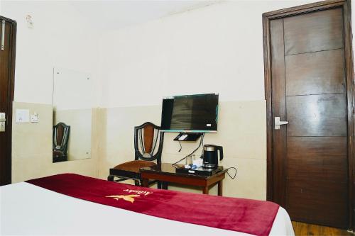 TV/Unterhaltungsangebot in der Unterkunft Hotel Arthcontinental By Admire Stays