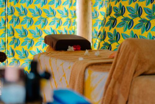 a table with a cloth on top of it at Pearl Beach by Sansi in Michamvi