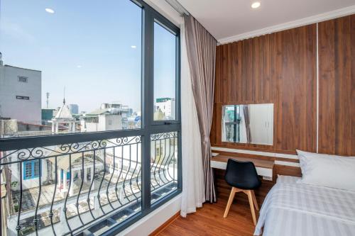 Katil atau katil-katil dalam bilik di Sumitomo Apartment - Linh Lang street