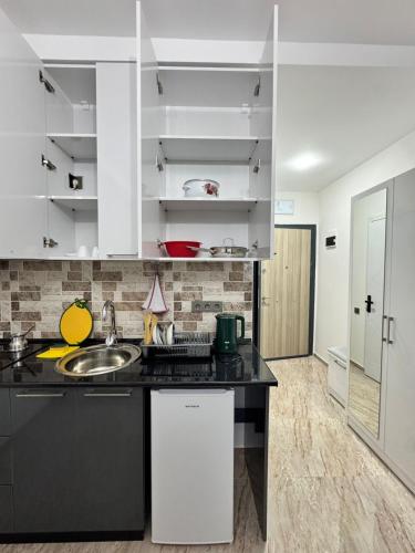 Kuchyň nebo kuchyňský kout v ubytování Giga Guest House